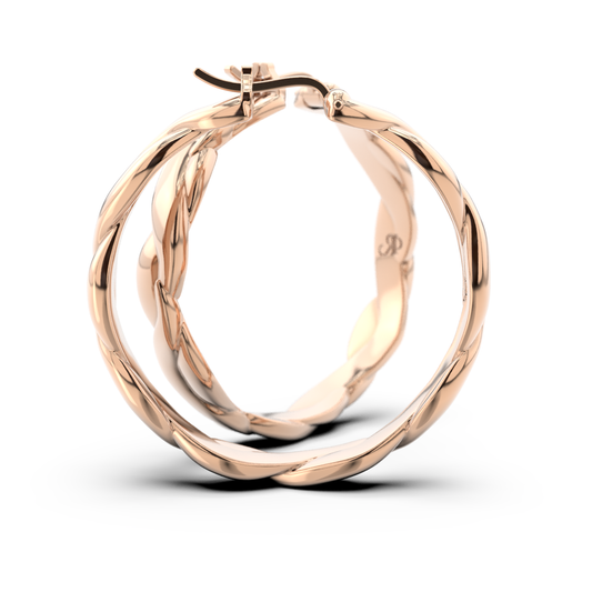 Side view of Abbraccio del Mare earrings in 18k rose gold by Rocco Pagliara